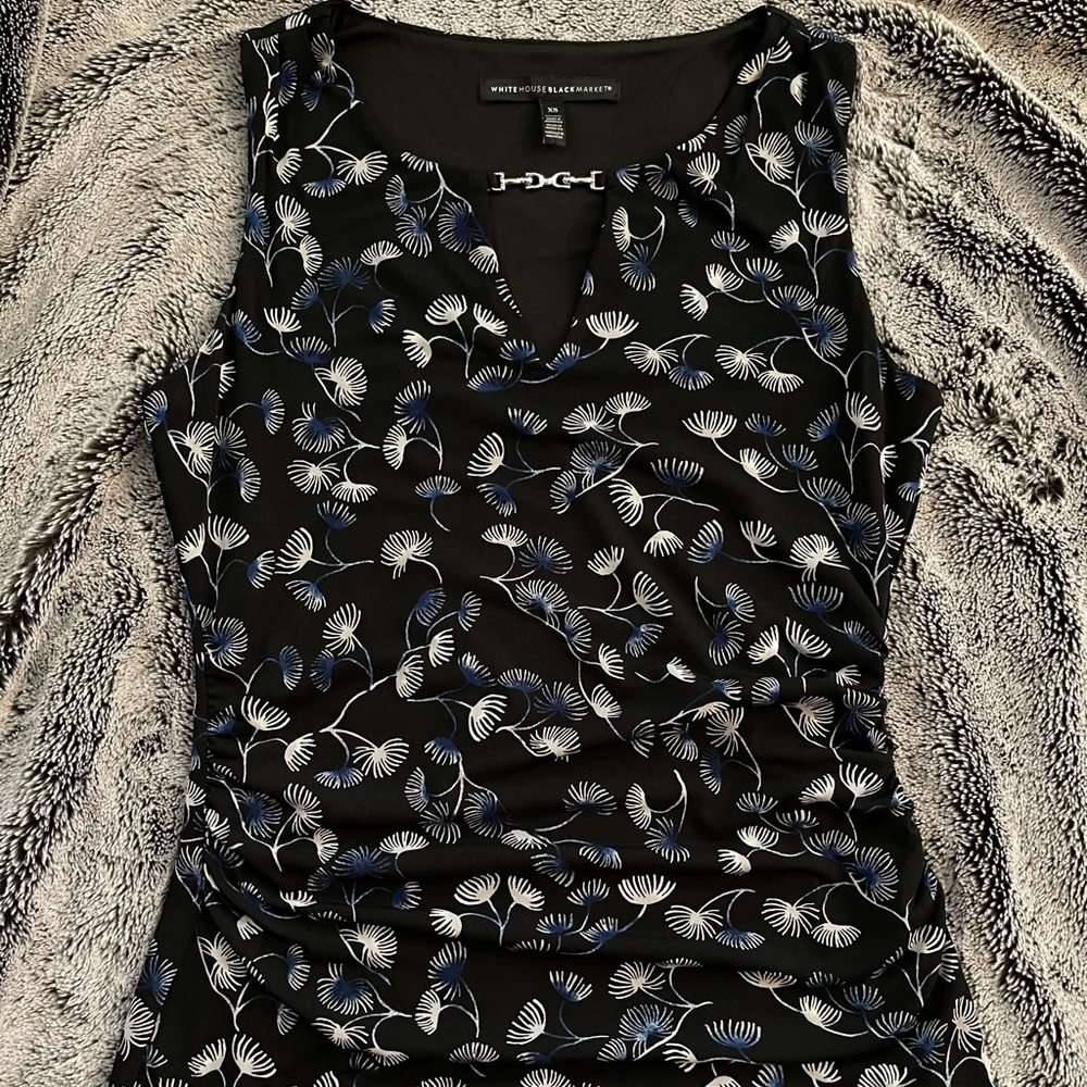 WHBM sleeveless v-cut blouse with silver chain detailing.
